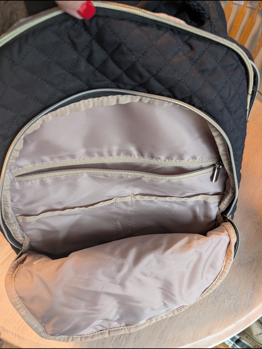 Quilted Black Travel Backpack with Beige Interior
